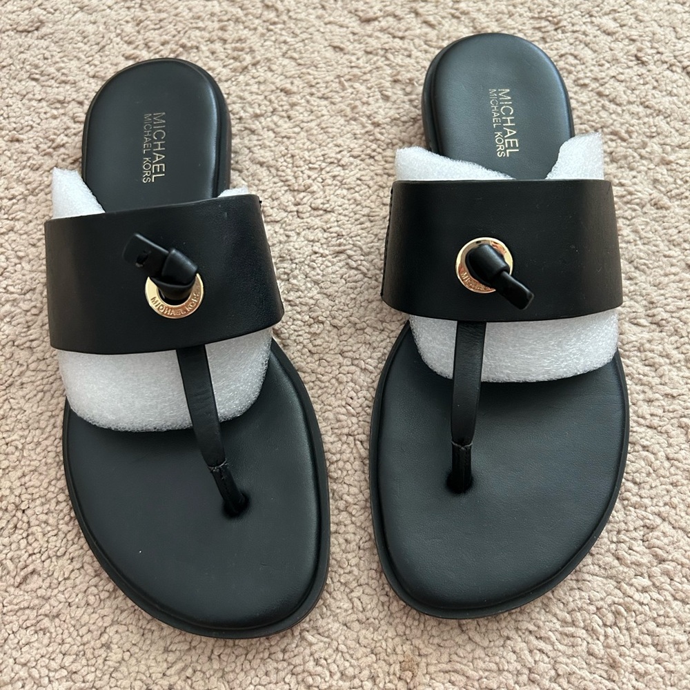 MICHAEL Michael Kors Women’s Cindy Vachetta Flat Thong Sandals Black Leather